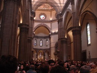 Waiting in the Churcb for the Ceremonial Fire-lighting to begin on Easter Sunday.